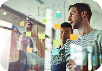 Team brainstorming with sticky notes